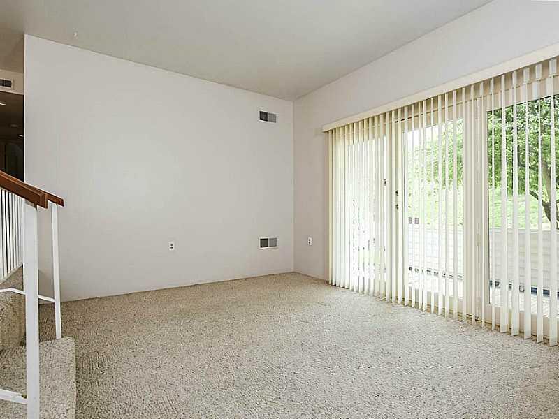 1405 Kenzie Road Pittsburgh, PA 15205 - Photo 5 of 23 Living Room. Sunken Living Room. Access to covered patio area.