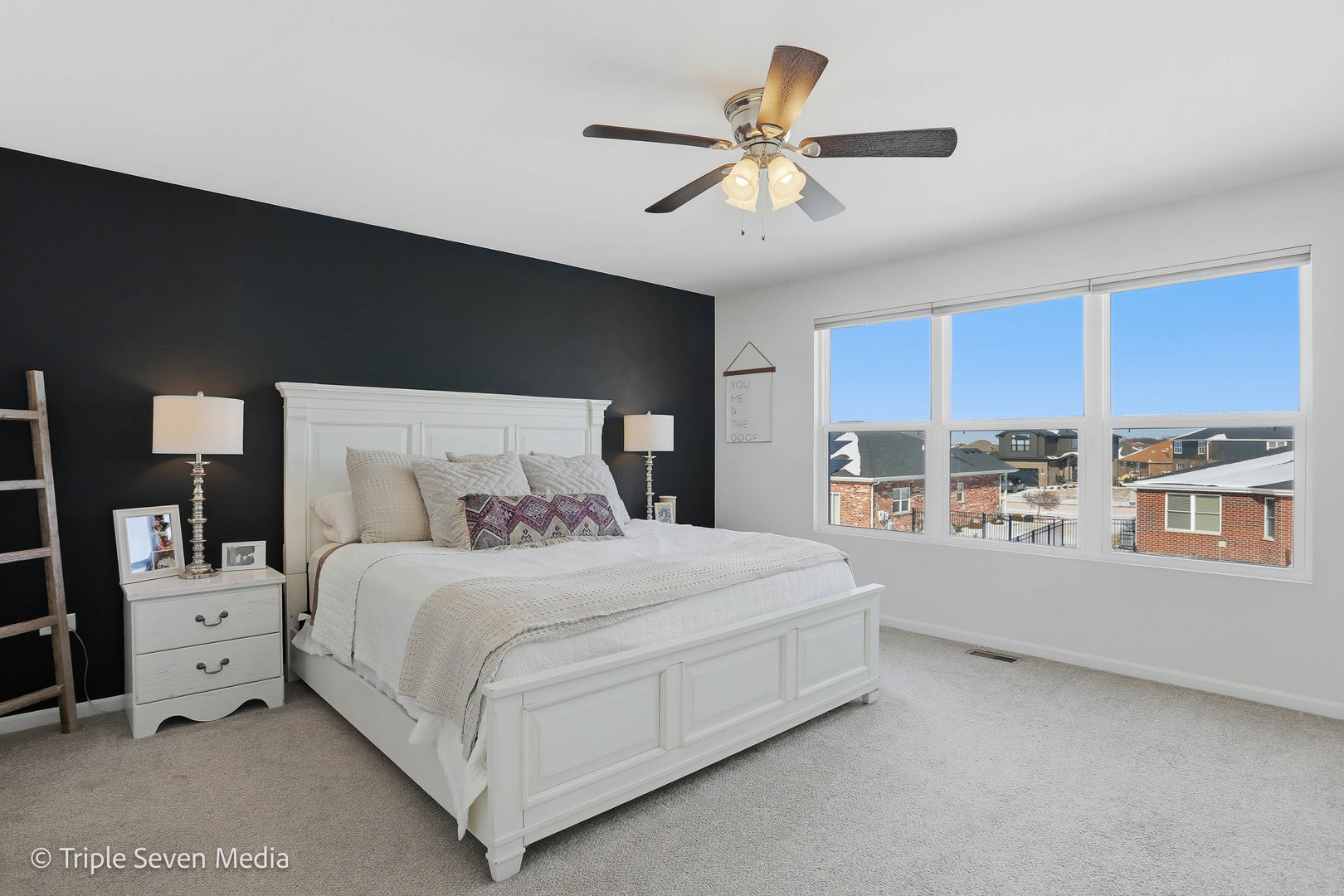 16256 Pinto Lane Manhattan, IL 60442 - Photo 19 of 32 a bedroom with a large bed and a large window