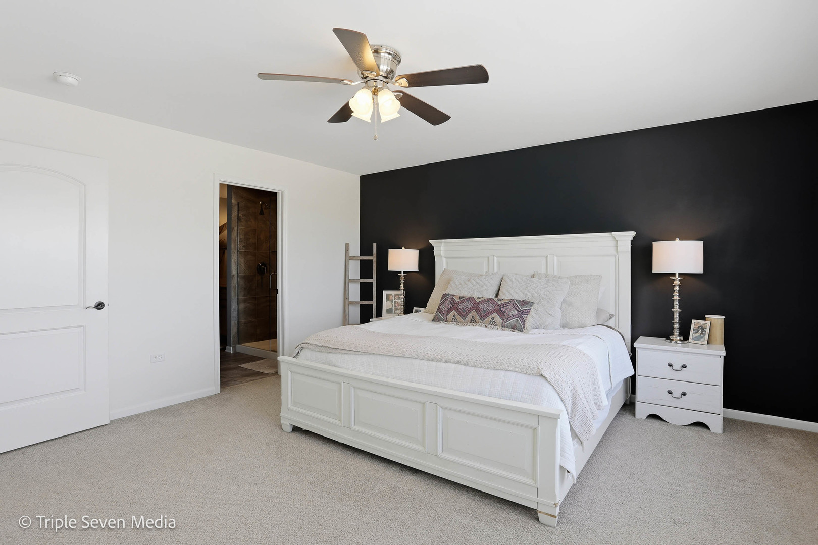 16256 Pinto Lane Manhattan, IL 60442 - Photo 20 of 32 a bedroom with a bed and a ceiling fan