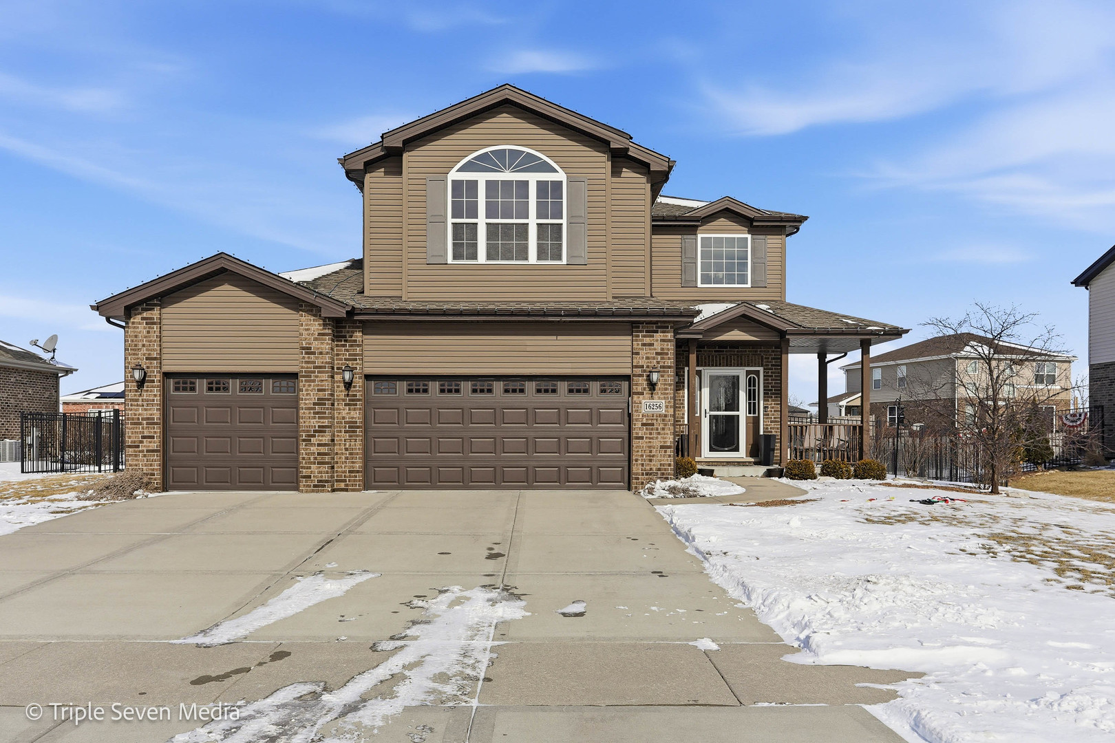 16256 Pinto Lane Manhattan, IL 60442 - Photo 2 of 32 a front view of a house with a yard