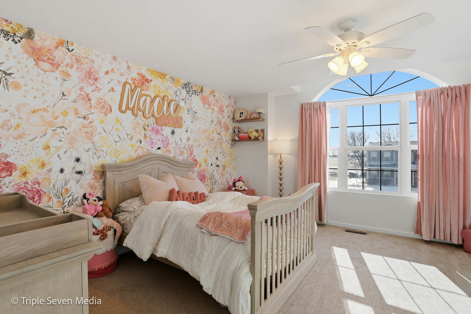 16256 Pinto Lane Manhattan, IL 60442 - Photo 29 of 32 a bedroom with a bed and a chandelier