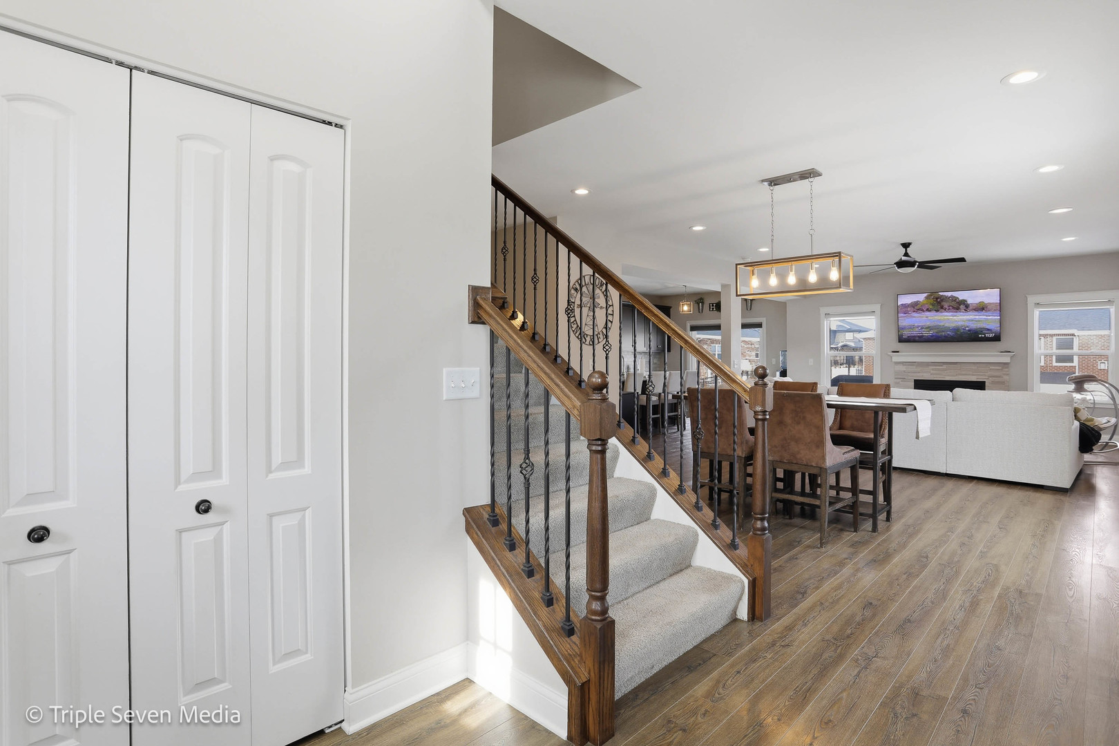 16256 Pinto Lane Manhattan, IL 60442 - Photo 4 of 32 a view of a hallway with dining room and stairs
