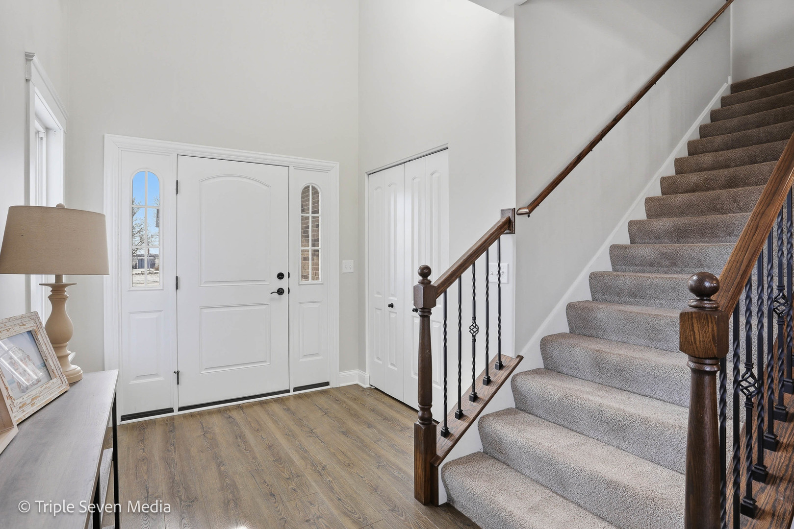 16256 Pinto Lane Manhattan, IL 60442 - Photo 5 of 32 a view of an entryway with wooden floor and a couch