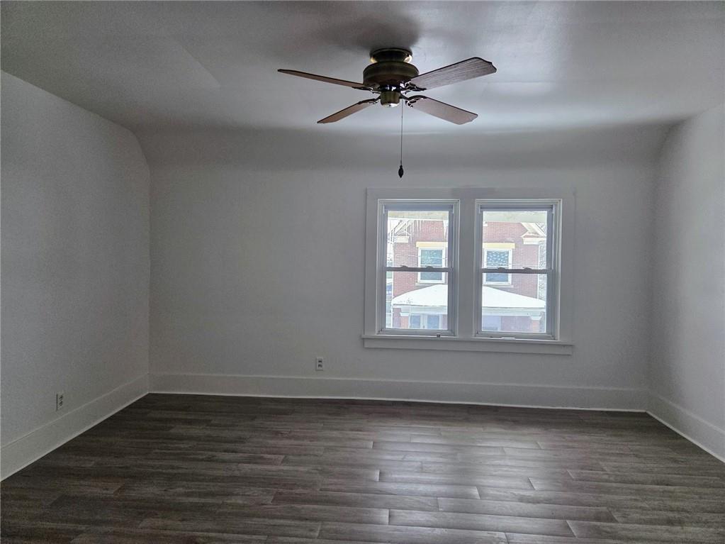 306 Spruce Street Butler, PA 16001 - Photo 18 of 47 wooden floor in an empty room with a window