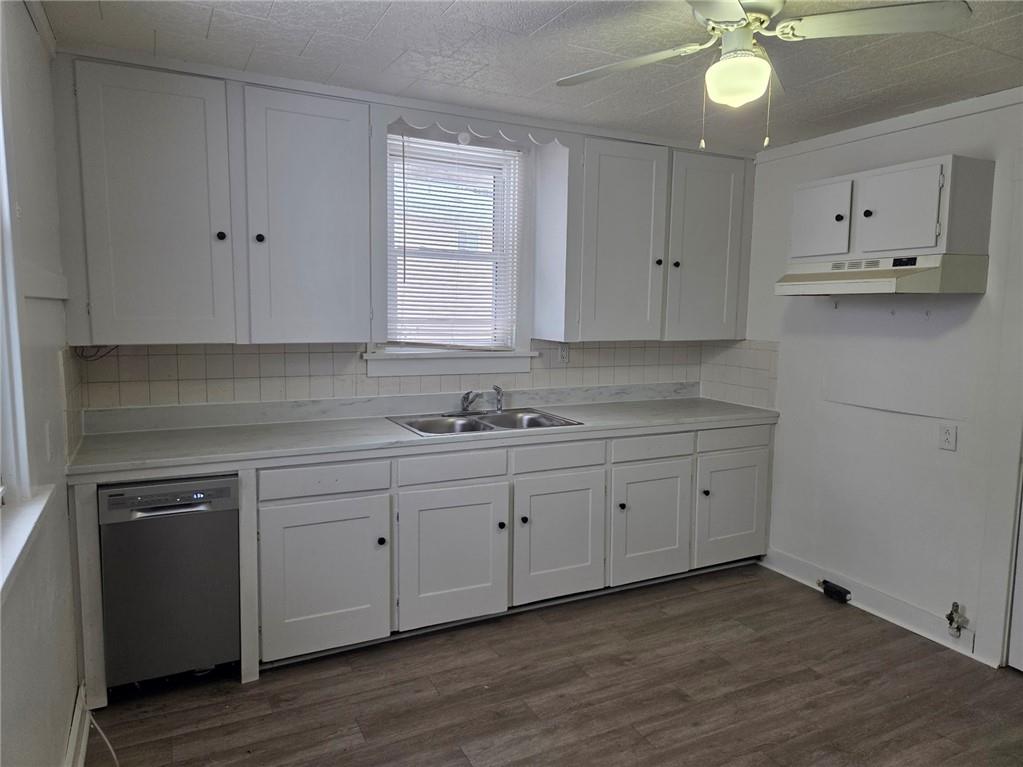 306 Spruce Street Butler, PA 16001 - Photo 35 of 47 a kitchen with sink cabinets and window
