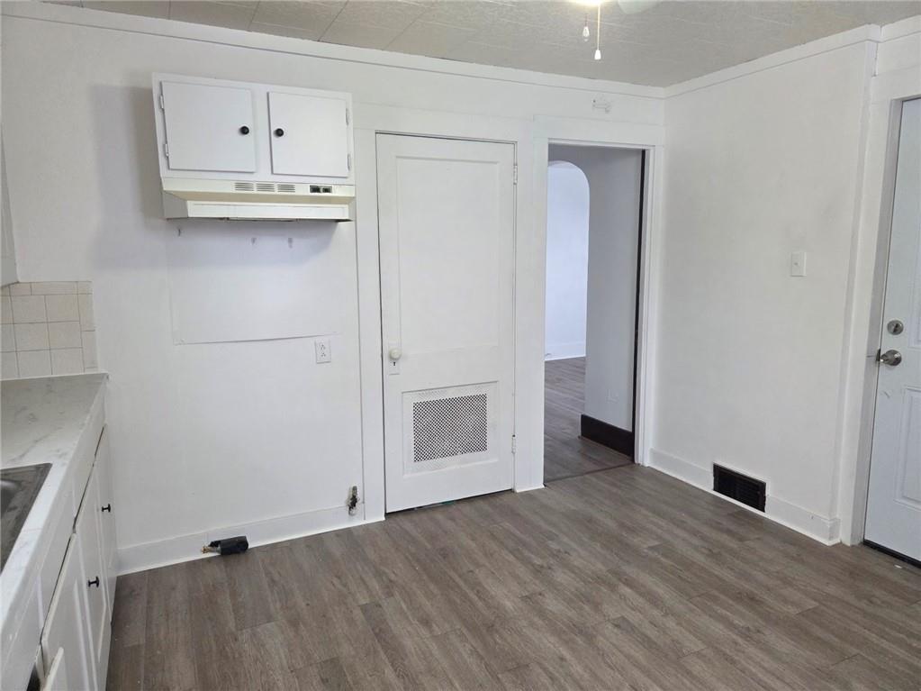 306 Spruce Street Butler, PA 16001 - Photo 37 of 47 a view of kitchen with wooden floor and electronic appliances