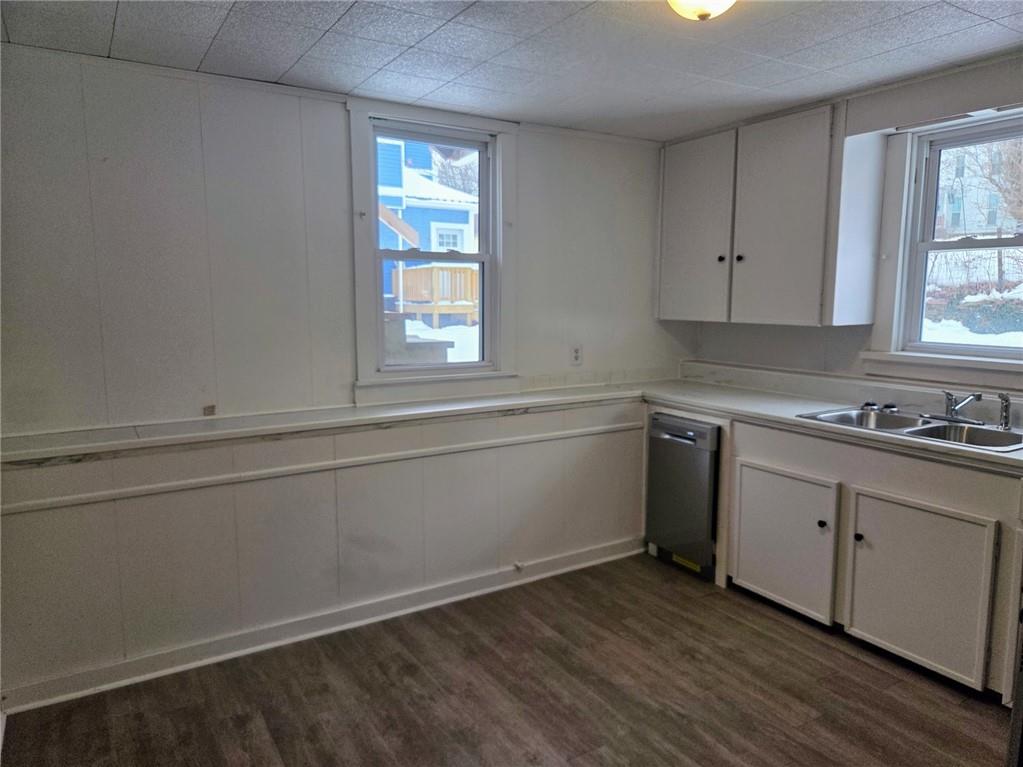 306 Spruce Street Butler, PA 16001 - Photo 7 of 47 a view of a kitchen with wooden floor and a window