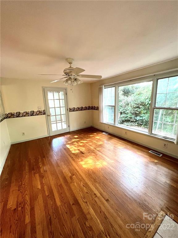2525 Holbrook Road Fort Mill, SC 29715 - Photo 14 of 29 wooden floor in an empty room with a window