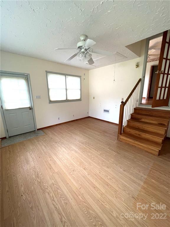 2525 Holbrook Road Fort Mill, SC 29715 - Photo 16 of 29 wooden floor in an empty room with a window