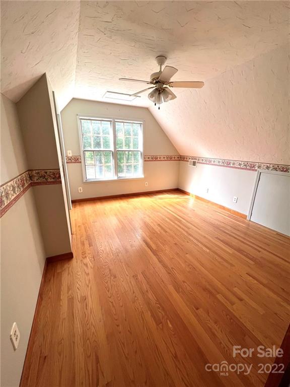 2525 Holbrook Road Fort Mill, SC 29715 - Photo 18 of 29 wooden floor in an empty room with a window