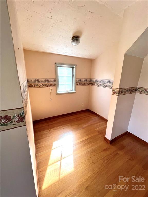 2525 Holbrook Road Fort Mill, SC 29715 - Photo 20 of 29 a view of a room with wooden floor