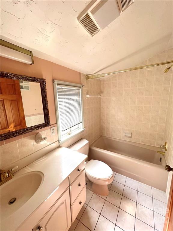 2525 Holbrook Road Fort Mill, SC 29715 - Photo 22 of 29 a bathroom with a sink a toilet a mirror and bathtub