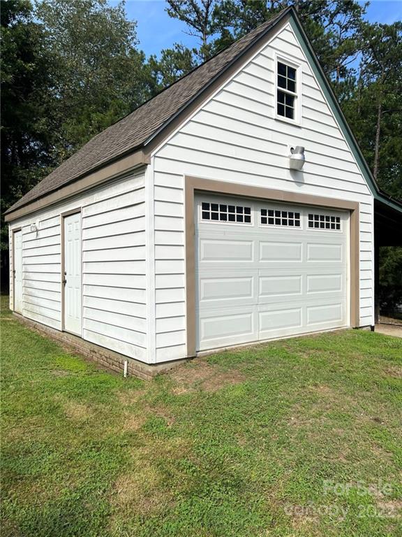 2525 Holbrook Road Fort Mill, SC 29715 - Photo 24 of 29 a view of a house with a yard