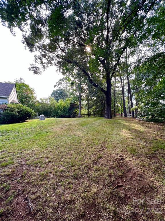 2525 Holbrook Road Fort Mill, SC 29715 - Photo 28 of 29 a view of outdoor space with trees all around