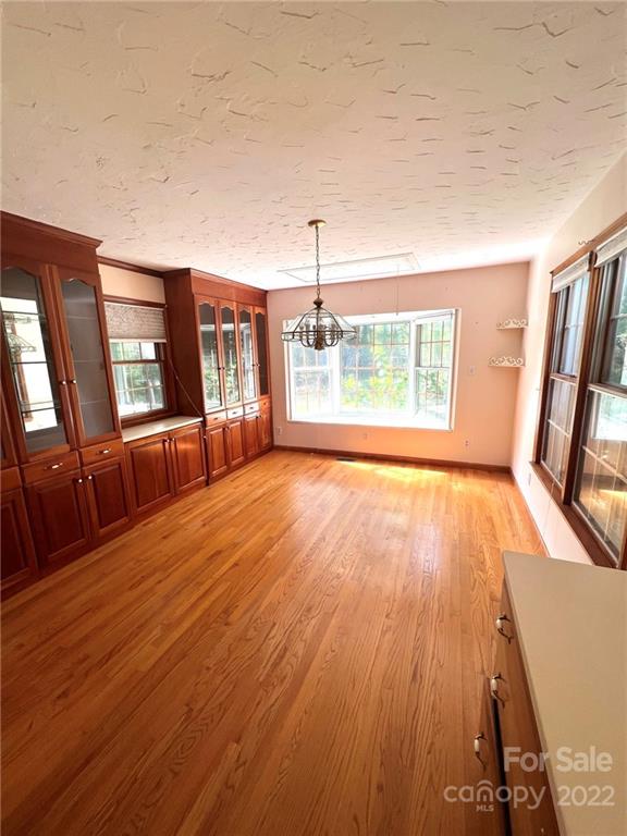2525 Holbrook Road Fort Mill, SC 29715 - Photo 8 of 29 wooden floor in an empty room with a window