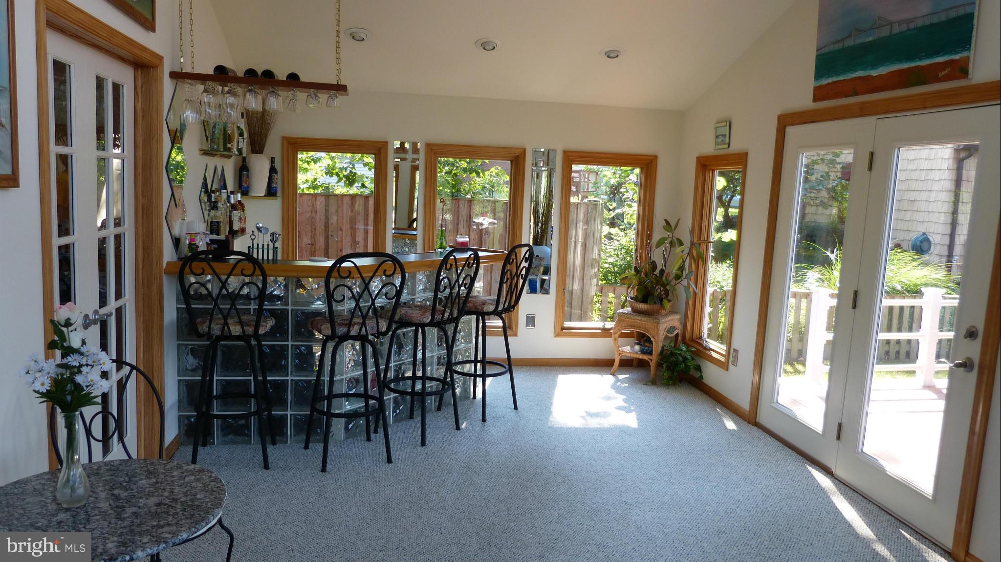 326 Steedman Point Road Pasadena, MD 21122 - Photo 11 of 30 Sunroom has great views of Ross Cove