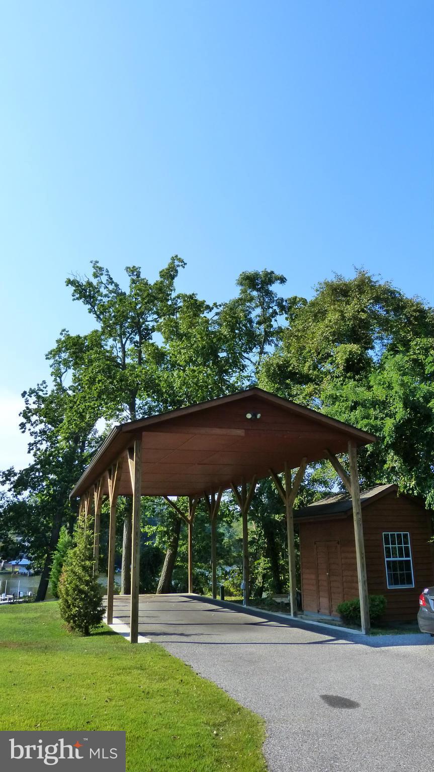 326 Steedman Point Road Pasadena, MD 21122 - Photo 24 of 30 51' x 18' paved RV/Boat Port w/hook-ups