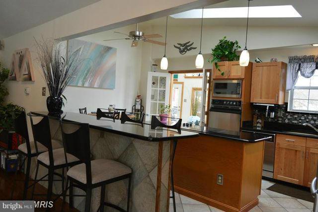 326 Steedman Point Road Pasadena, MD 21122 - Photo 8 of 30 Kitchen off Living room