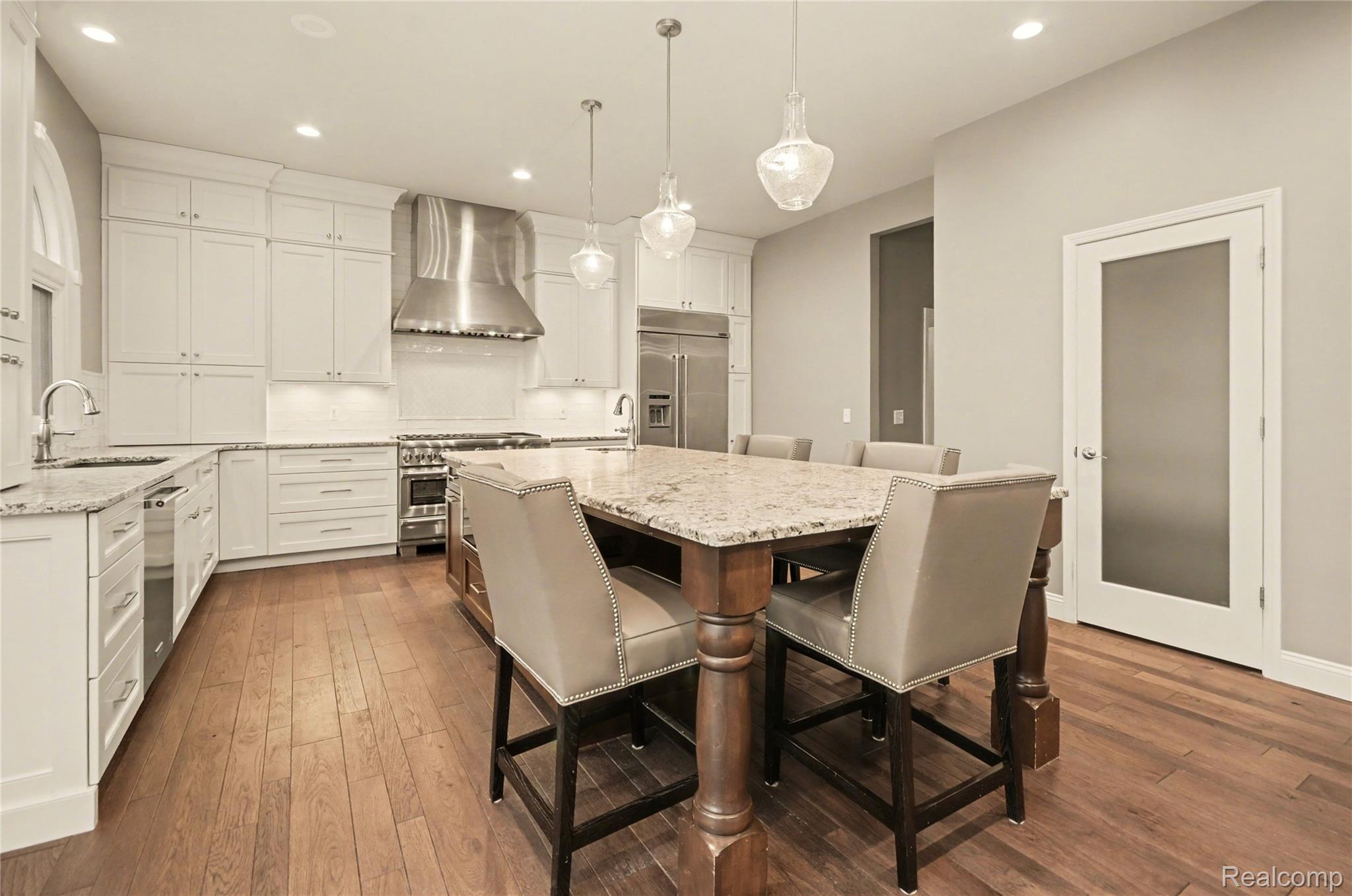 4179 St Andrews Street Howell, MI 48843 - Photo 13 of 75 Large island, walk-in pantry, and tons of room for entertaining