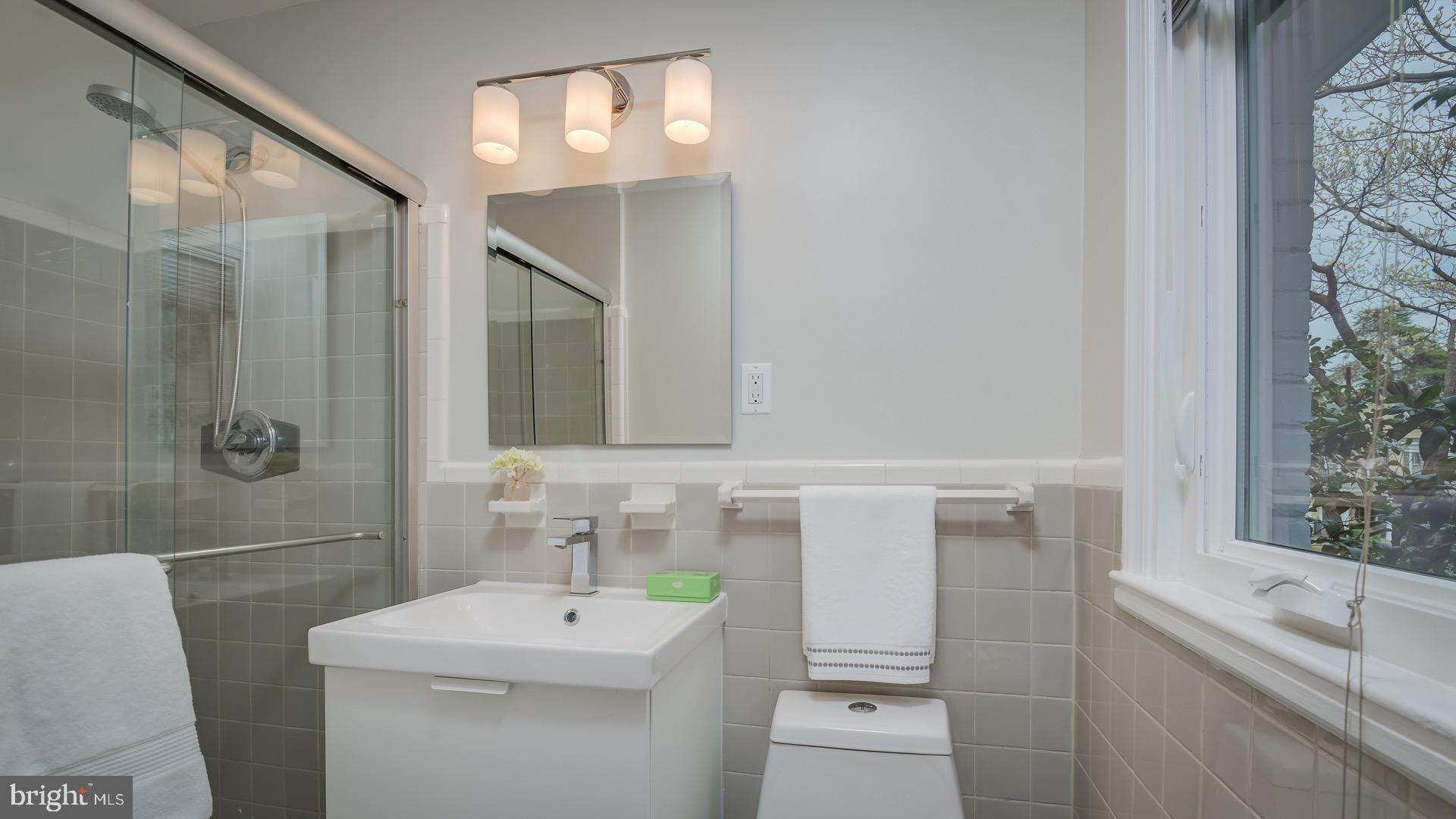6212 Wedgewood Road Bethesda, MD 20817 - Photo 16 of 38 Natural light and ventilation. Marble mosaic floor