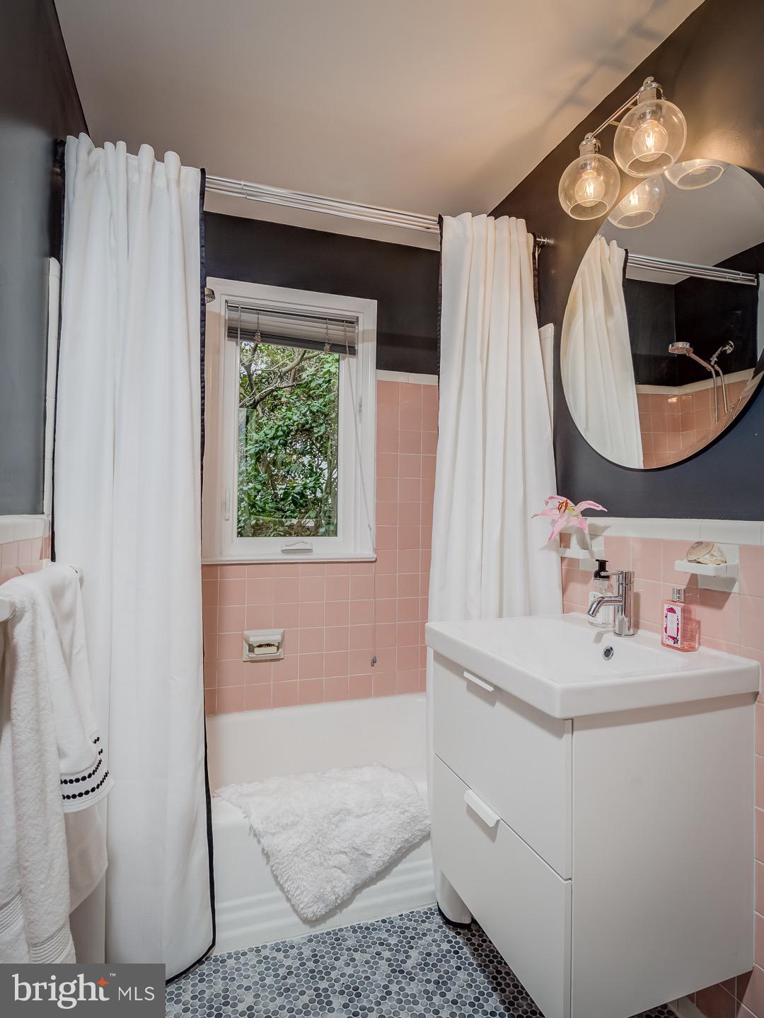 6212 Wedgewood Road Bethesda, MD 20817 - Photo 20 of 38 Updated hall bathroom. Natural light & ventilation