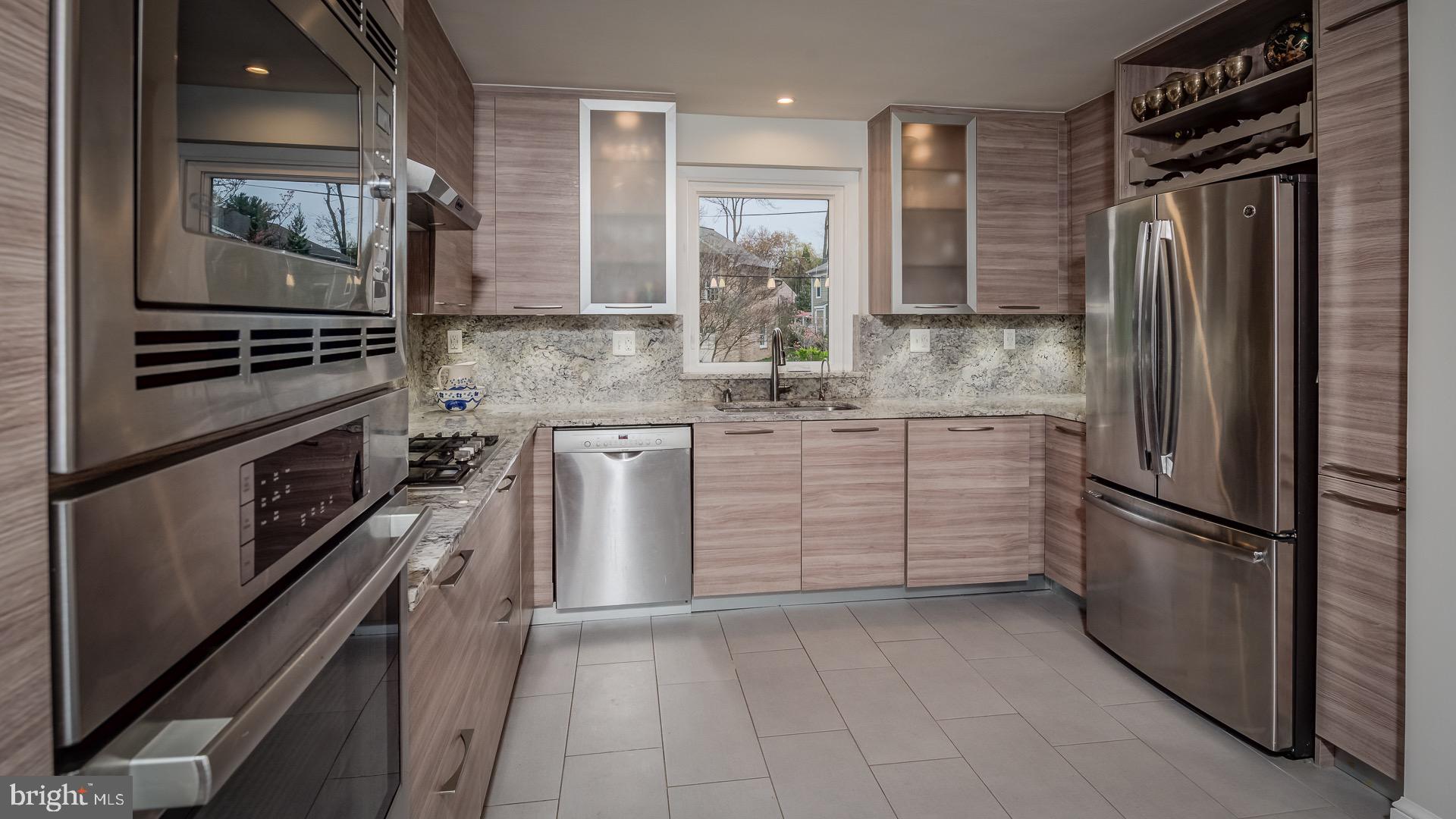 6212 Wedgewood Road Bethesda, MD 20817 - Photo 7 of 38 Wine rack and pullout pantry