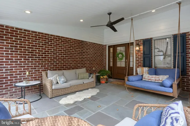 a living room with furniture and window