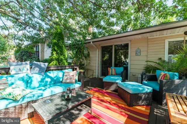 a backyard of a house with seating space