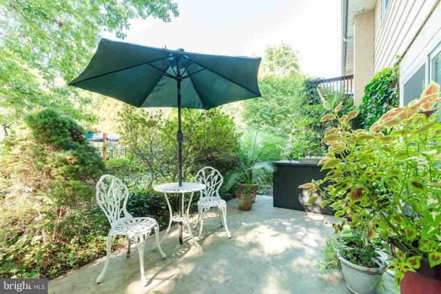 a garden view with a seating space