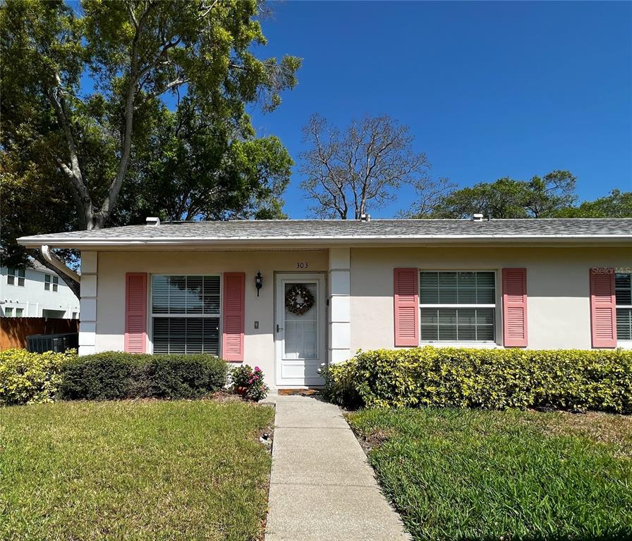 1535 Nursery Road, Unit 303 Clearwater, FL 33756 - Photo 1 of 1 Front of this ground floor, end unit in a quiet 55+ community located in Clearwater