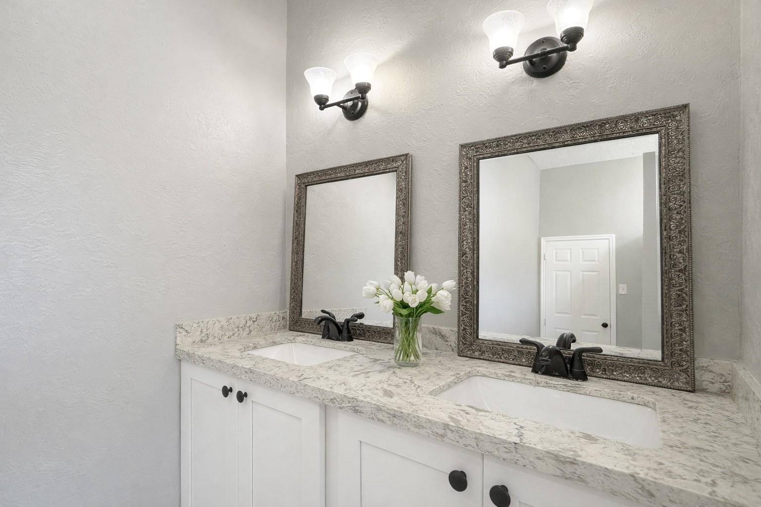 17007 Spruce Run Drive Spring, TX 77379 - Photo 16 of 23 a bathroom with a granite countertop sink and a mirror