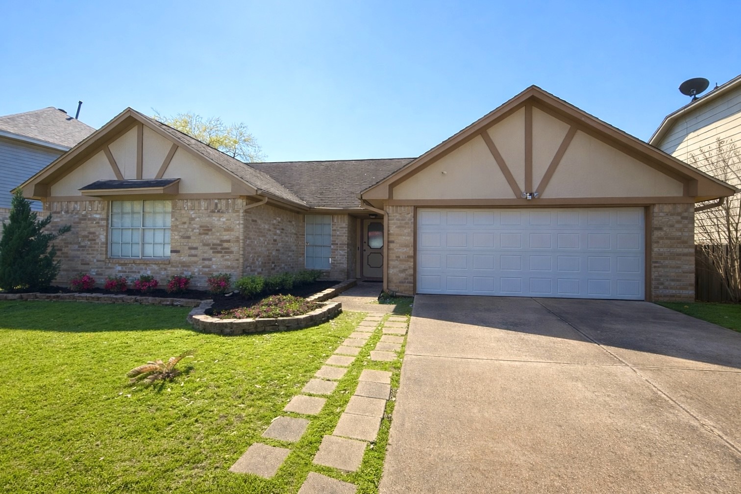 17007 Spruce Run Drive Spring, TX 77379 - Photo 2 of 23 a front view of a house with a yard and garage