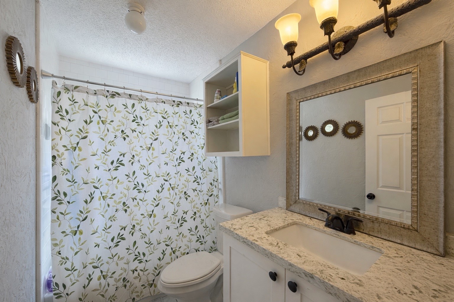 17007 Spruce Run Drive Spring, TX 77379 - Photo 21 of 23 a bathroom with a granite countertop sink toilet and shower