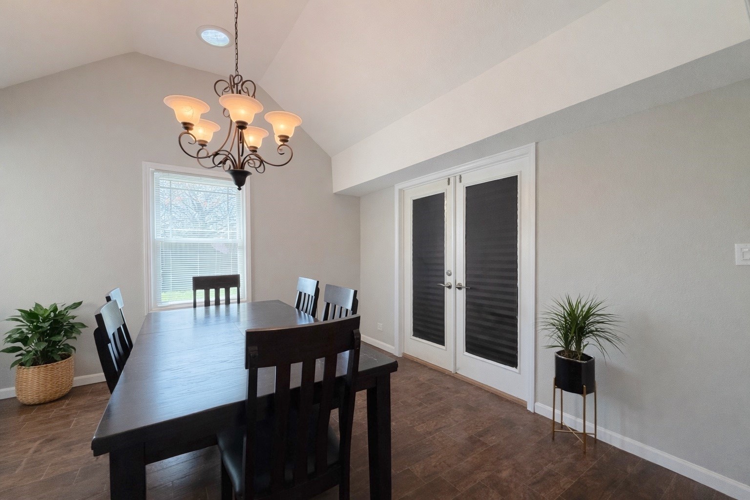 17007 Spruce Run Drive Spring, TX 77379 - Photo 7 of 23 a view of a dining room with furniture wooden floor and chandelier