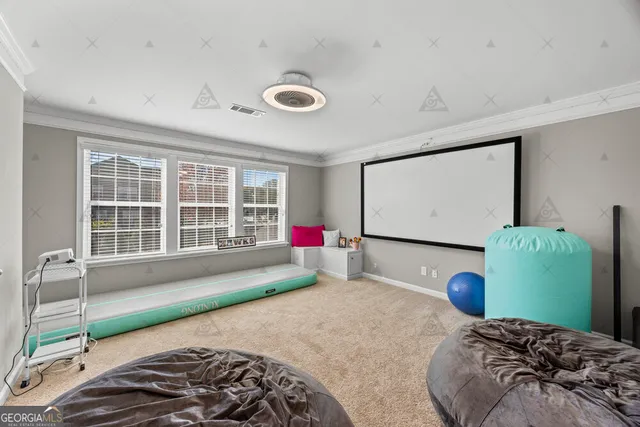 a view of a bedroom with furniture and staircase