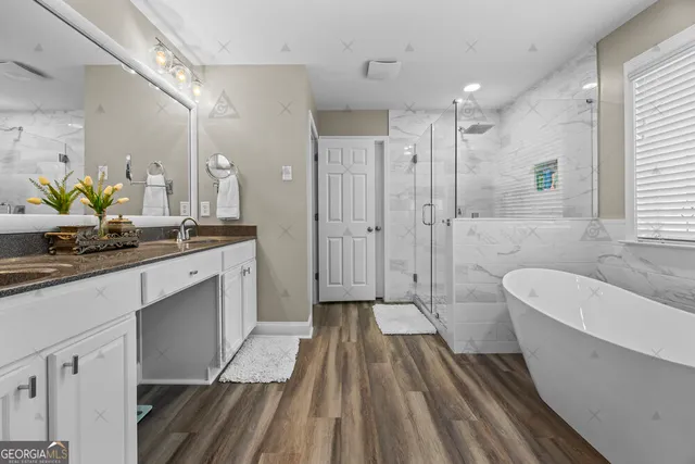 a bathroom with a toilet and a sink