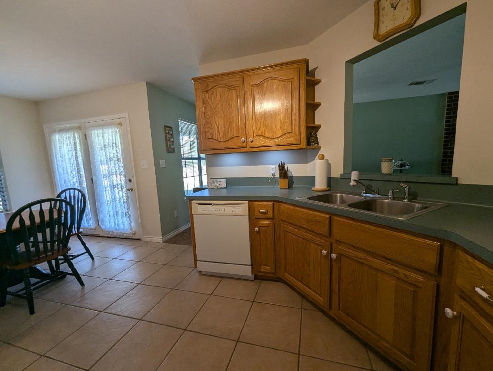 141 Coral Gables Trinity, TX 75862 - Photo 22 of 42 a spacious bathroom with a sink and a mirror