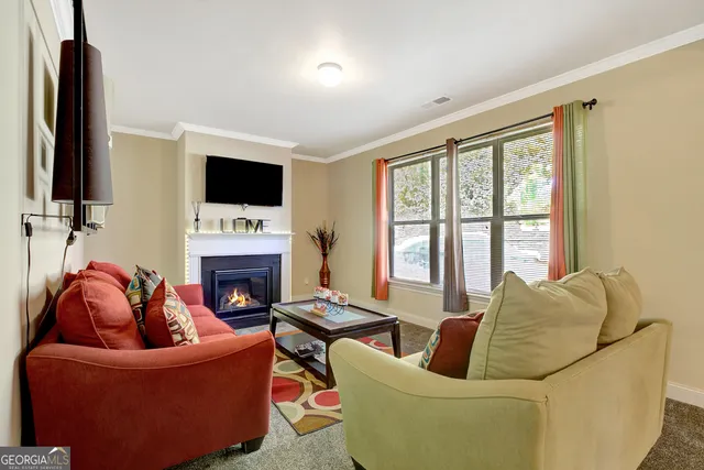 a bedroom with a bed and a view of bathroom