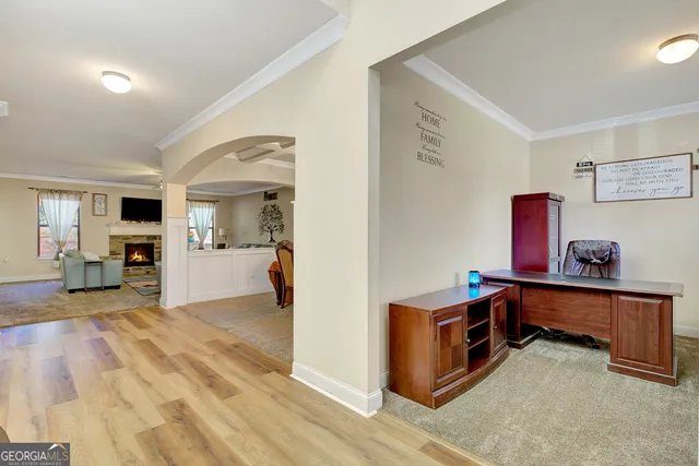 a view of livingroom with hardwood and furniture