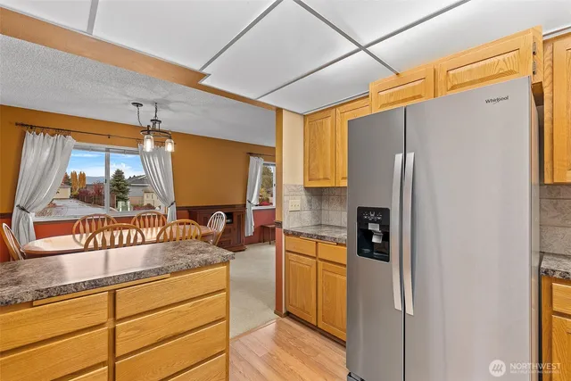 a bathroom with a sink a vanity and a toilet
