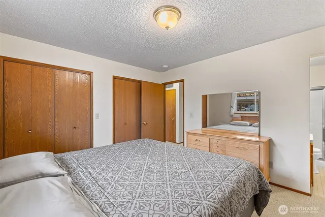 a view of a room with walk in closet and window