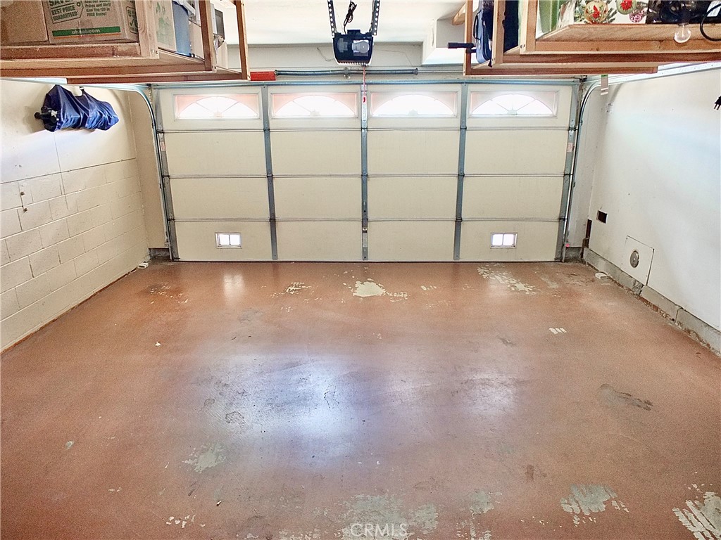 117 West Spring Street, Unit E Long Beach, CA 90806 - Photo 31 of 44 a view of a garage