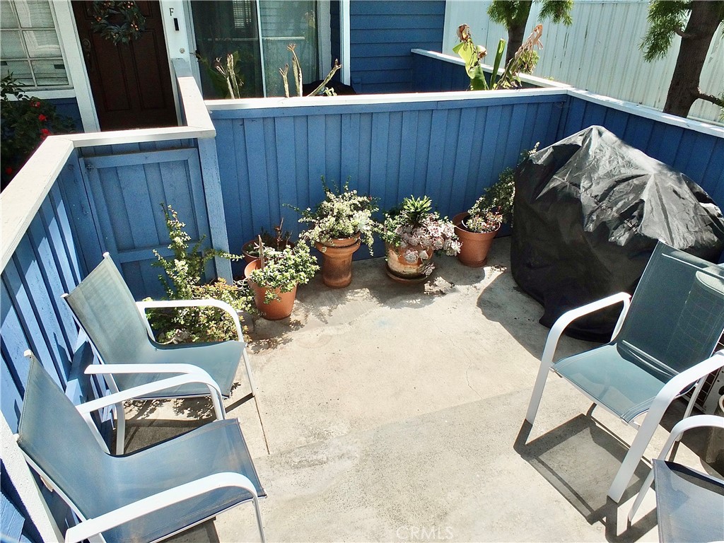 117 West Spring Street, Unit E Long Beach, CA 90806 - Photo 35 of 44 a view of a backyard with furniture