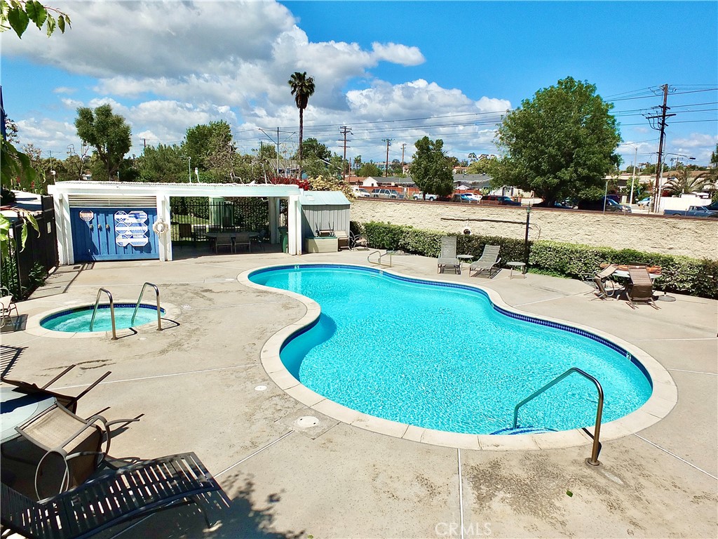 117 West Spring Street, Unit E Long Beach, CA 90806 - Photo 41 of 44 an aerial view of a swimming pool