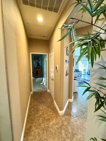 a bedroom with bed and a couch