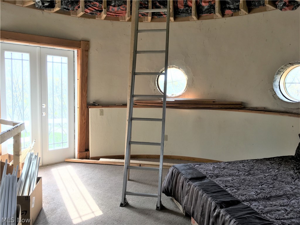 4630 Kolbe Road Lorain, OH 44053 - Photo 32 of 35 Fifth floor doors to balcony. Rotating roof attic accessed via ladder.