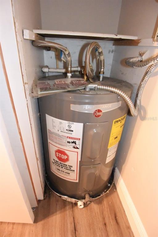 5845 Elm Street New Port Richey, FL 34652 - Photo 38 of 38 a view of water heater on a shelf