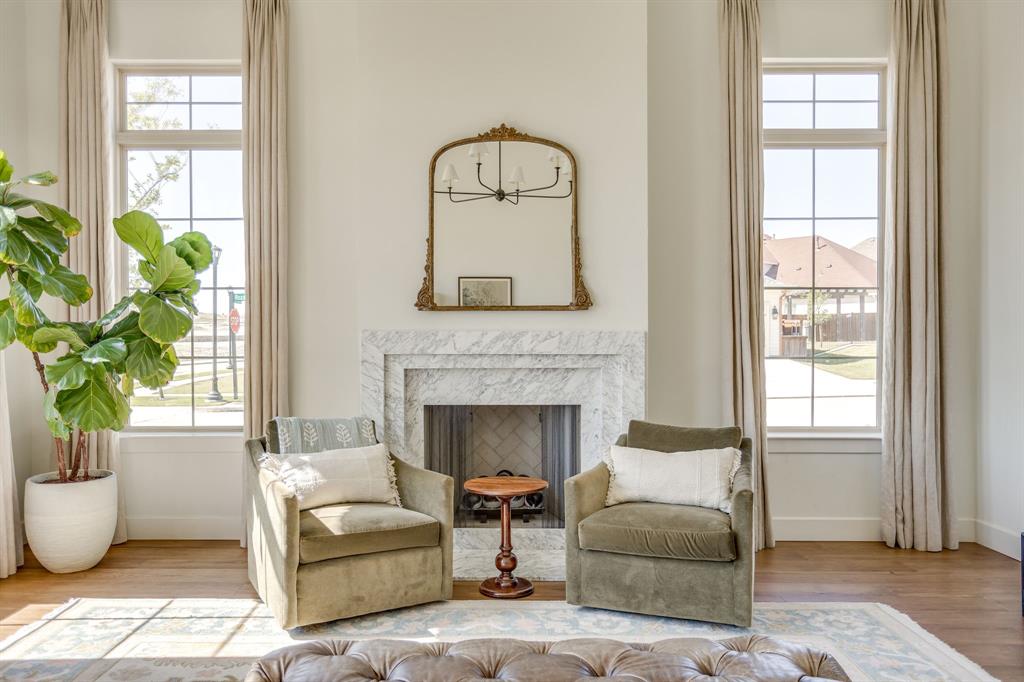 14000 Rozana Street Fort Worth, TX 76008 - Photo 6 of 38 a living room with furniture a window and a fireplace