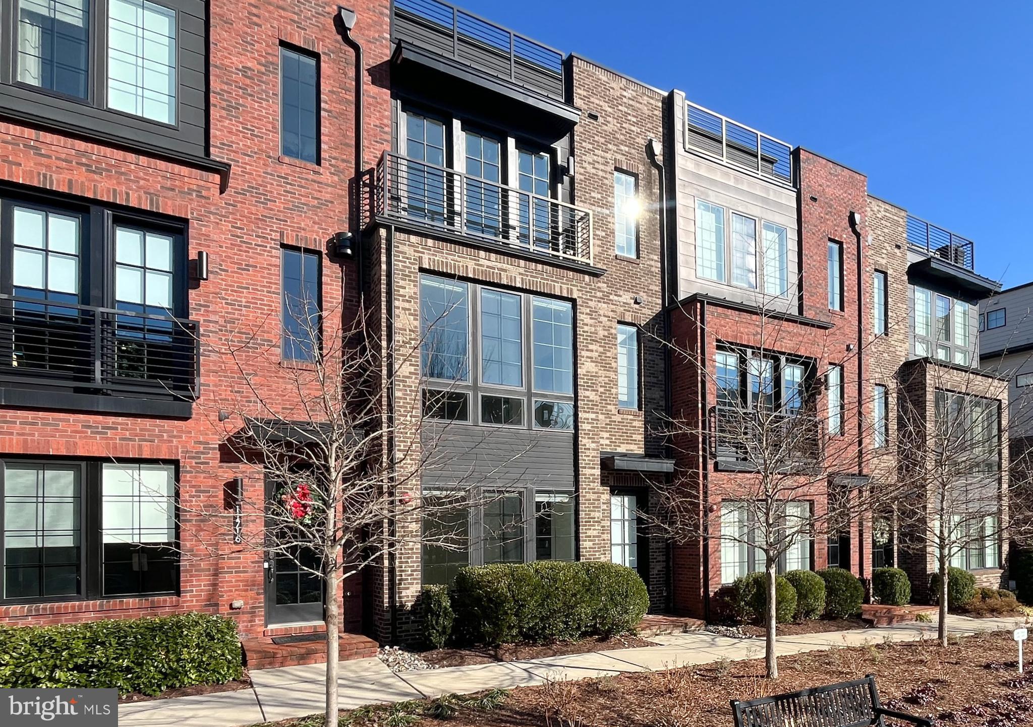 11714 Paysons Way Reston, VA 20191 - Photo 1 of 33 a front view of a multi story building