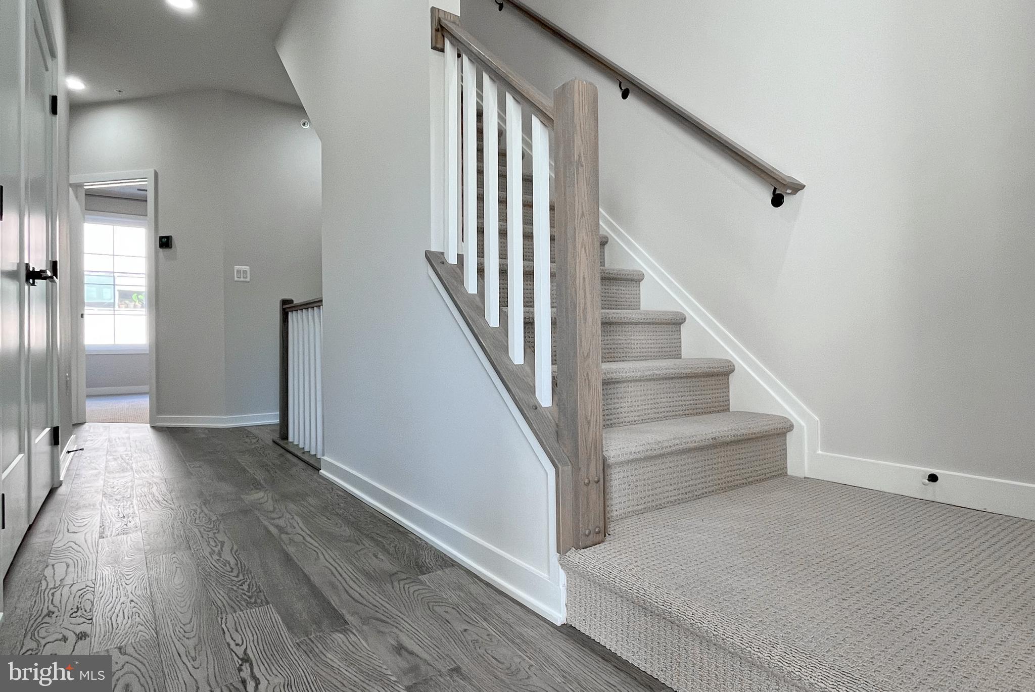 11714 Paysons Way Reston, VA 20191 - Photo 14 of 33 a view of entryway and hall with wooden floor